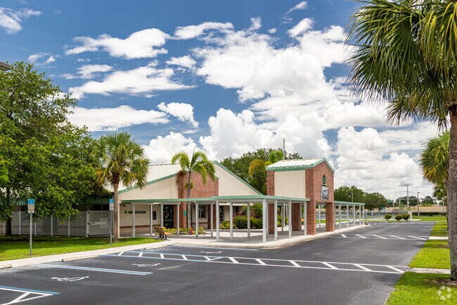 Corkscrew Elementary School near Orangetree has a designated drop-off area in front of the entrance.