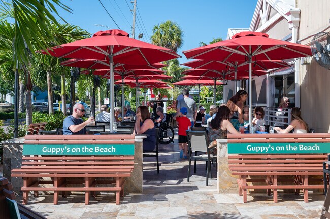 Guppy's On the Beach is a popular spot with eclectic, upscale seafood dishes near Harbor Bluffs.
