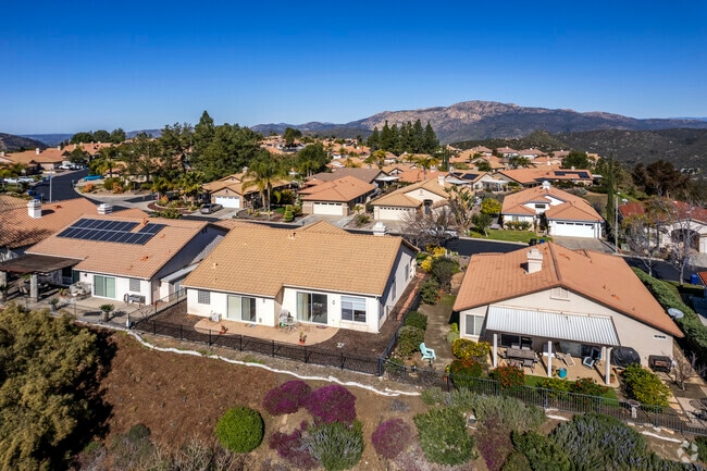 Tuscan-style homes line the streets in Alpine's Crown Hills neighborhood.