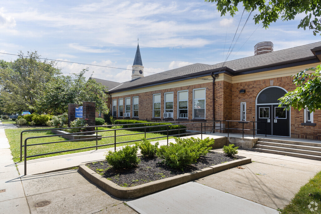 There are approximately 365 students at the Maurice Downing Primary School in Malverne, NY.