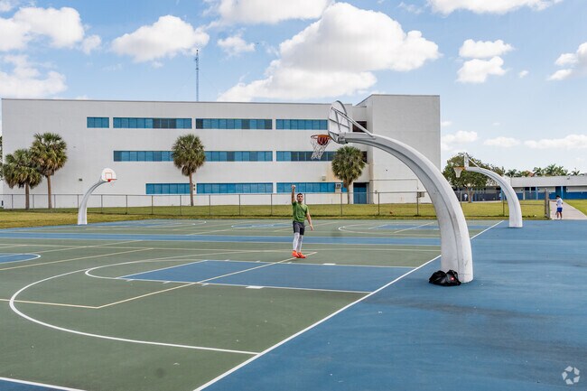 Many Fountainbleau East residents enjoy practicing their basketball shot at Dario Ruben Park.