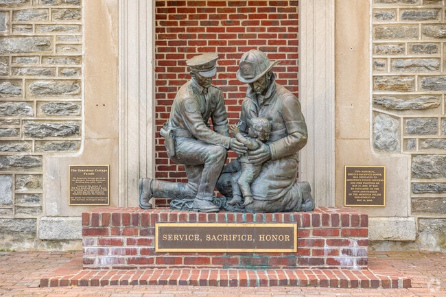 This memorial statue in Abington was dedicated to police officers and firefighters in May 2003.