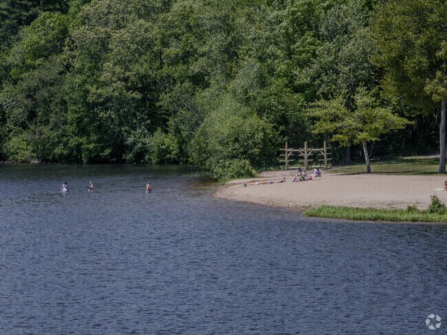East Haddam Town Beach offers a sandy beach, calm waters for swimming, and scenic views.