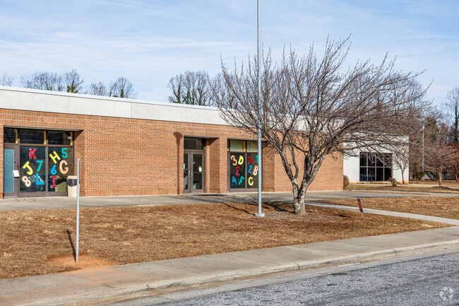 Petree Elementary's classrooms are adorned with vibrant window decorations.