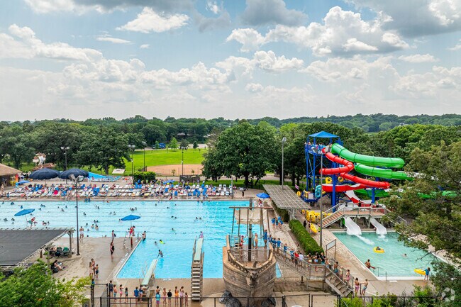 The Edina Aquatics Center in Rosland Park has water slides and diving boards.