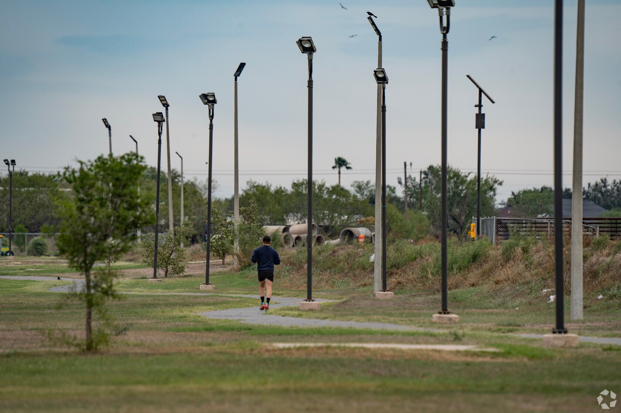 Jones Box Park offers a 1 mile walking trail, basketball and playground located in Las Milpas.
