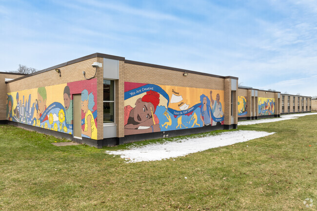 Colorful murals adorn the walls of Henderson Academy.