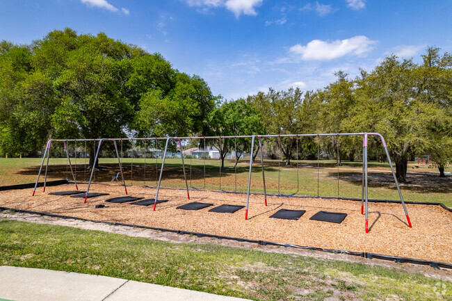 Students love to play on the swings at Emerald Shores Elementary.
