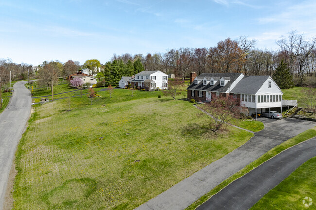 Country Club Road runs along Beekman Golf Course and provides various home styles in Beekman.
