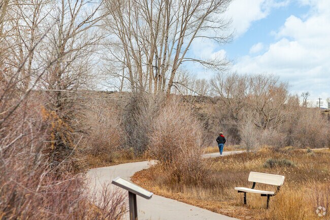 Residents enjoy a brisk morning walk at Bear River State Park in Evanston.