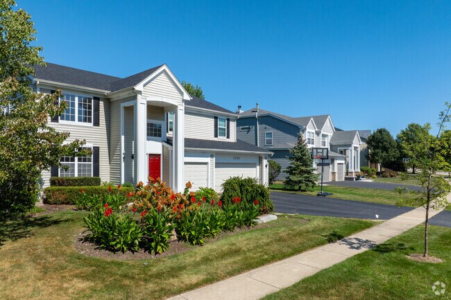 Tullamore residents decorate their yards with flowering landscaping.