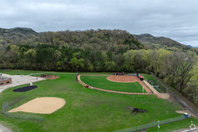 There are multiple baseball fields at State Road Elementary School.
