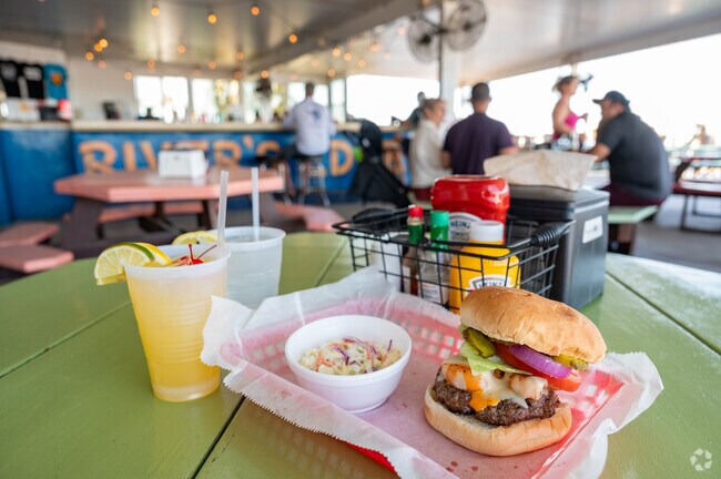 River's Edge Bar and Grill offers a casual burgers and seafood menu and low-key outpost vibe.