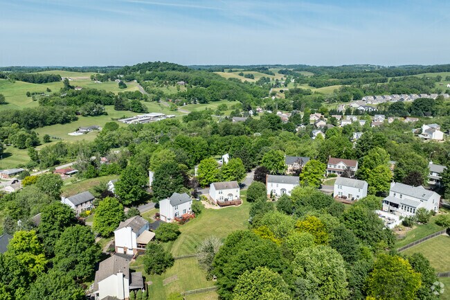 Single family homes are scattered throughout this rolling hills of Muse