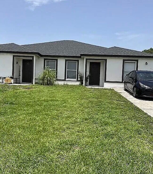1031 Abrams Blvd Unit One side duplex, Lehigh Acres, FL 33971