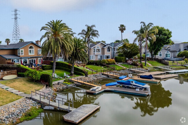 Palm trees and private boats are abundant in Bel Marin Keys.