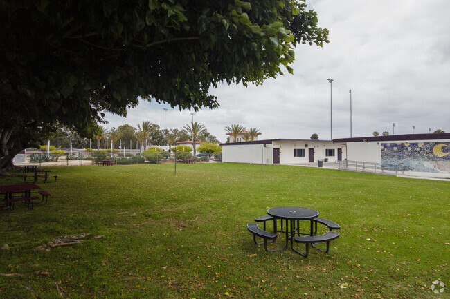 Shery (Kurt T.) High (Continuation) School also has an outdoor picnic table with an open field.