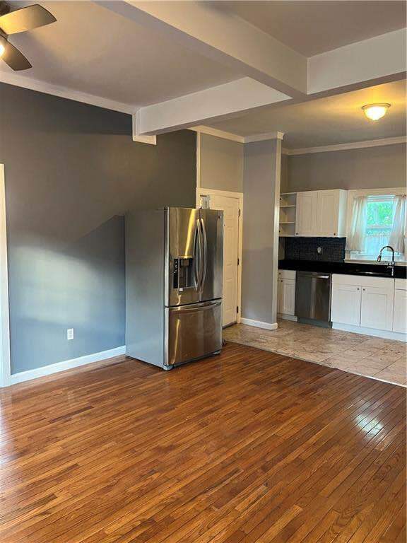 Fridge/front entrance of the unit