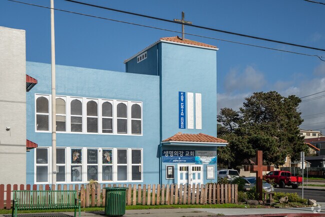 Roger Williams Academy is located next to a church.