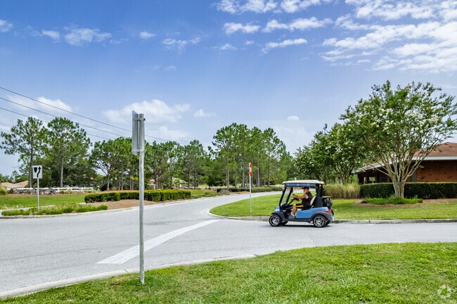 Cruising through On Top of the World in personal golf carts is a favorite way for residents to get around and enjoy the community.