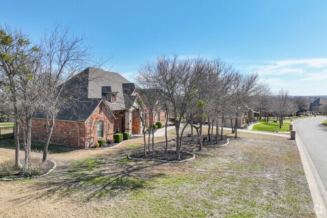 Suburban bliss and tree-lined streets are abundant in Lakeside, Ft. Worth.