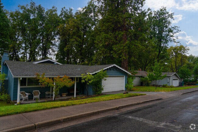 Mount Shasta residents enjoy sidewalk lined streets with a mix of lush trees.