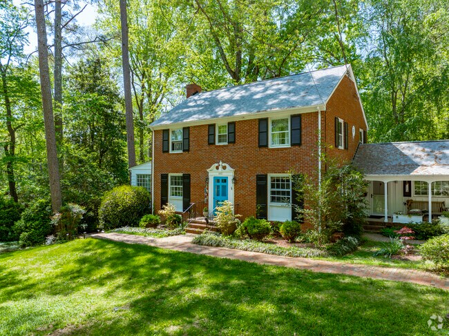 Colonial inspired homes are showcased against the beautiful forested backdrop of Kings Mill-Morgan Creek.