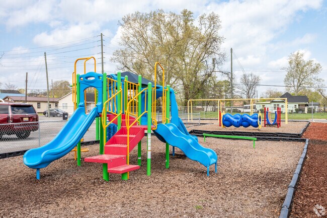 The colorful playground is a popular spot at the Holy Family Elementary School in Tuxedo, AL..