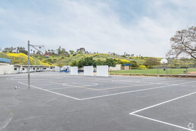 Students at George White Elementary School can play basketball or on the open fields.