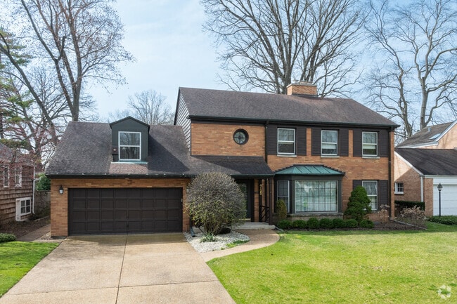 A Custom Built Home in North Skokie has clean landscaping ready for spring.