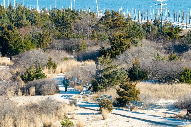 Cedar Beach West has a paved walking path that runs along the beach, close to Rocky Point.