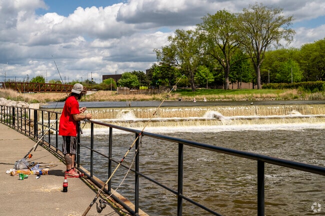 Residents of Downtown Flint enjoy easy fishing access from trails along the Flint River.