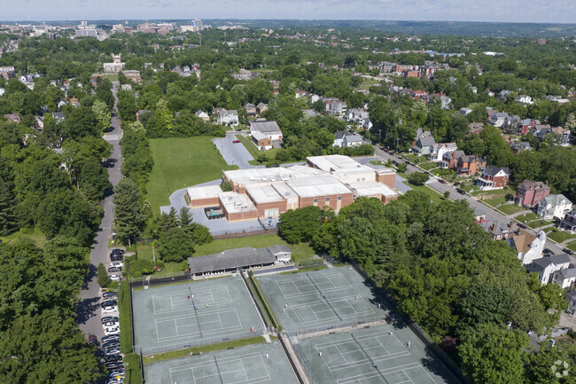 The campus for Evanston Academy Elementary School offers tennis courts, playground, and more.
