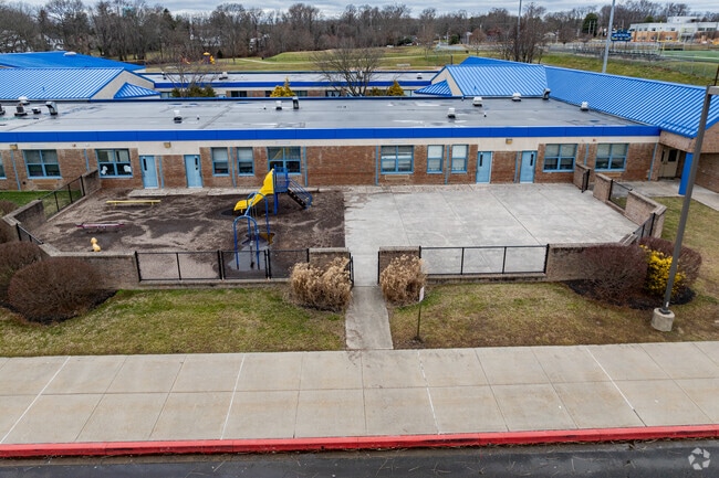 There is a fenced playground Bakerfield Elementary for Pre-K students.