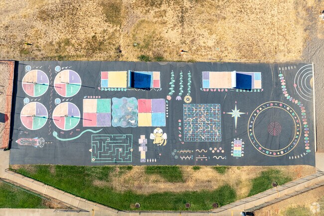 The blacktop at Happy Valley Primary School is vibrant and colorful.