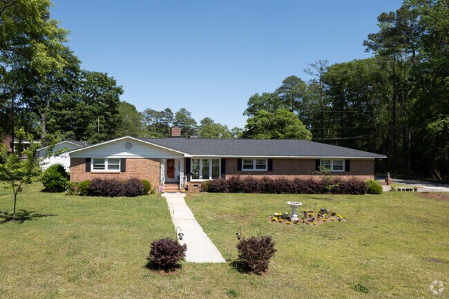 Low-profile roofs on ranch homes help reduce energy use especially on hot summer Carolina days.