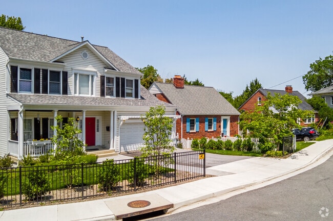 Single-family homes line the quiet neighborhood streets of W Chevy Chase Heights.