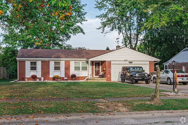 The morning sun illuminates a pretty ranch on a quiet street in The Westside Village.