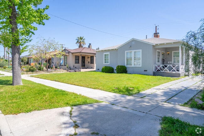 The charming cottage-style homes in Burbank exude a warm and inviting atmosphere, with their colorful façades and quaint gardens that capture the essence of the neighborhood.