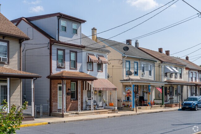 West Lebanon townhouses line the streets with social front porches and comfortable sidewalks.