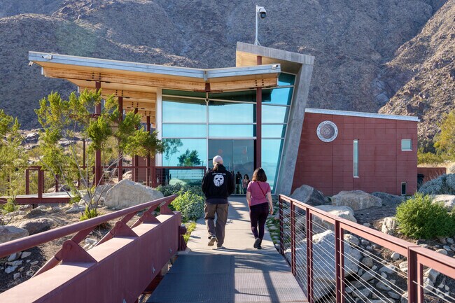 Visitors checking out the Tahquitz Canyon Visitors Center, just outside of the Warm Sands area.