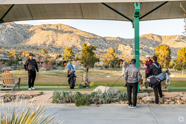 Yucca Valley locals spend their evening perfecting their swing at Hawk's Landing Golf Club.