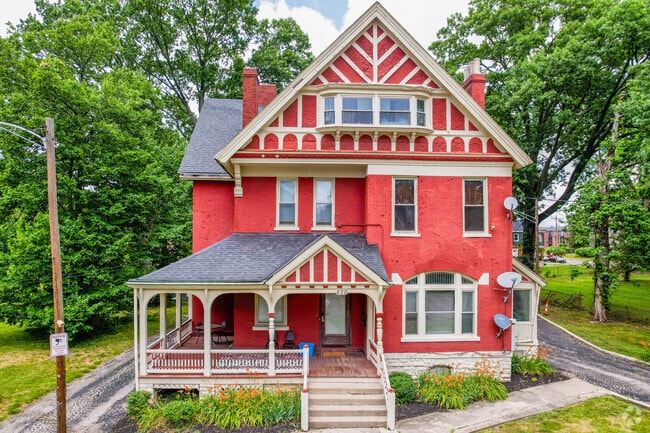 Residents of this 19th-century  Walnut Hills property enjoy a spacious porch.