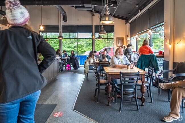 Enjoy a cup of coffee with a friend in one of many coffee shops in The Highlands.