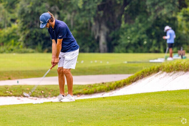 Up your putting game on the greens at Grande Vista Golf Club.