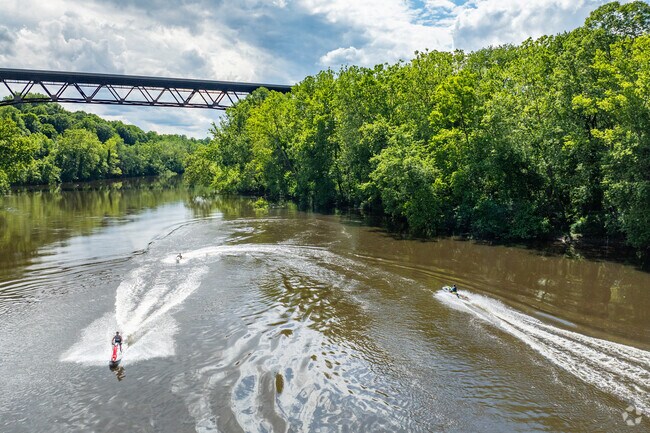 Jet Skiers ride the Lehigh River in the Old Orchard neighborhood.