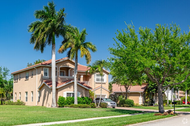Rural Estates has many traditional Florida homes with red tile roofs and tropical landscaping.