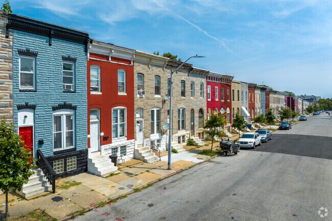 Some of the stone rowhomes in Mondawmin have colorful facades to stand out.