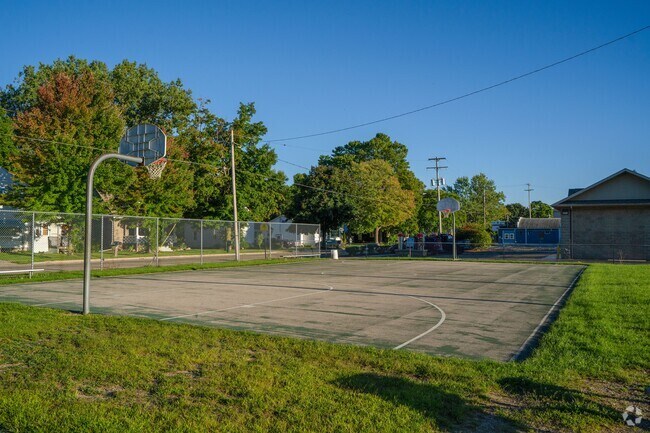 Catch a quick game of basketball with local residents at Rayner Park.