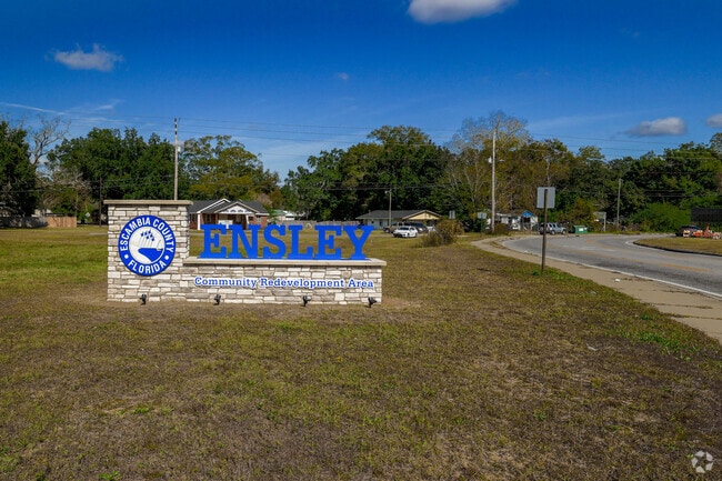 Ensley sign welcomes residents near Escambia Bay.